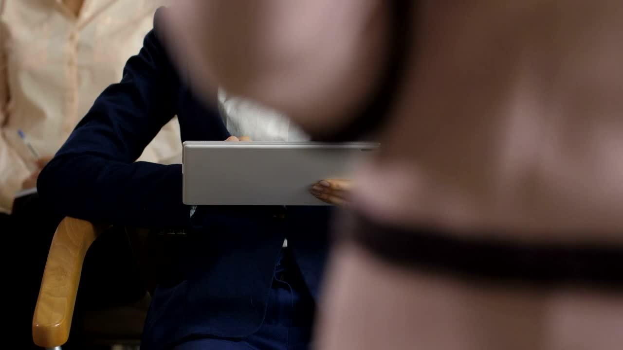 Stock Footage Woman Using A Tablet To Take Notes Live Wallpaper Free