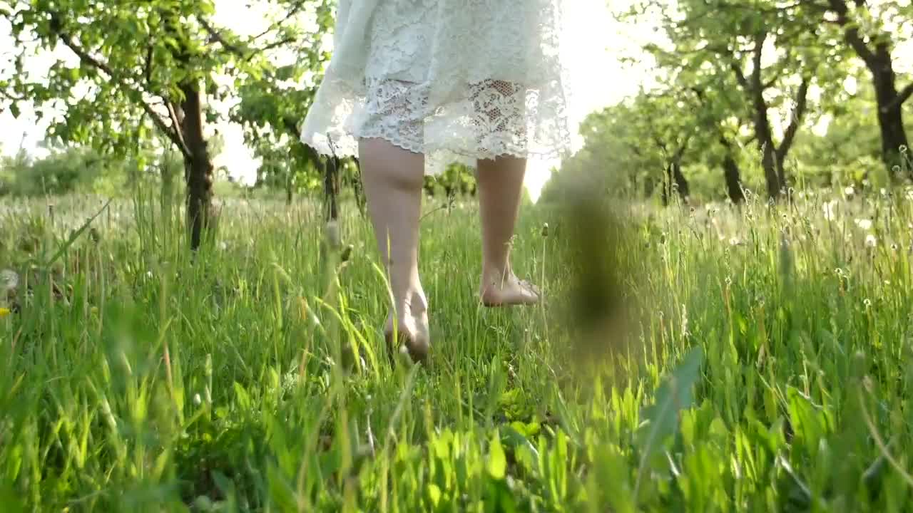 Stock Footage Woman Walking On Grass Live Wallpaper Free