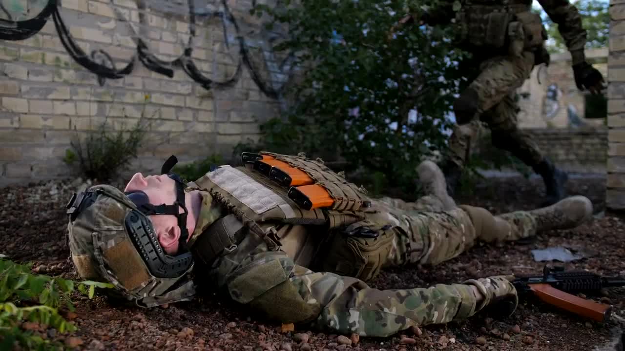 Stock Footage Wounded Soldier Being Assisted Live Wallpaper Free
