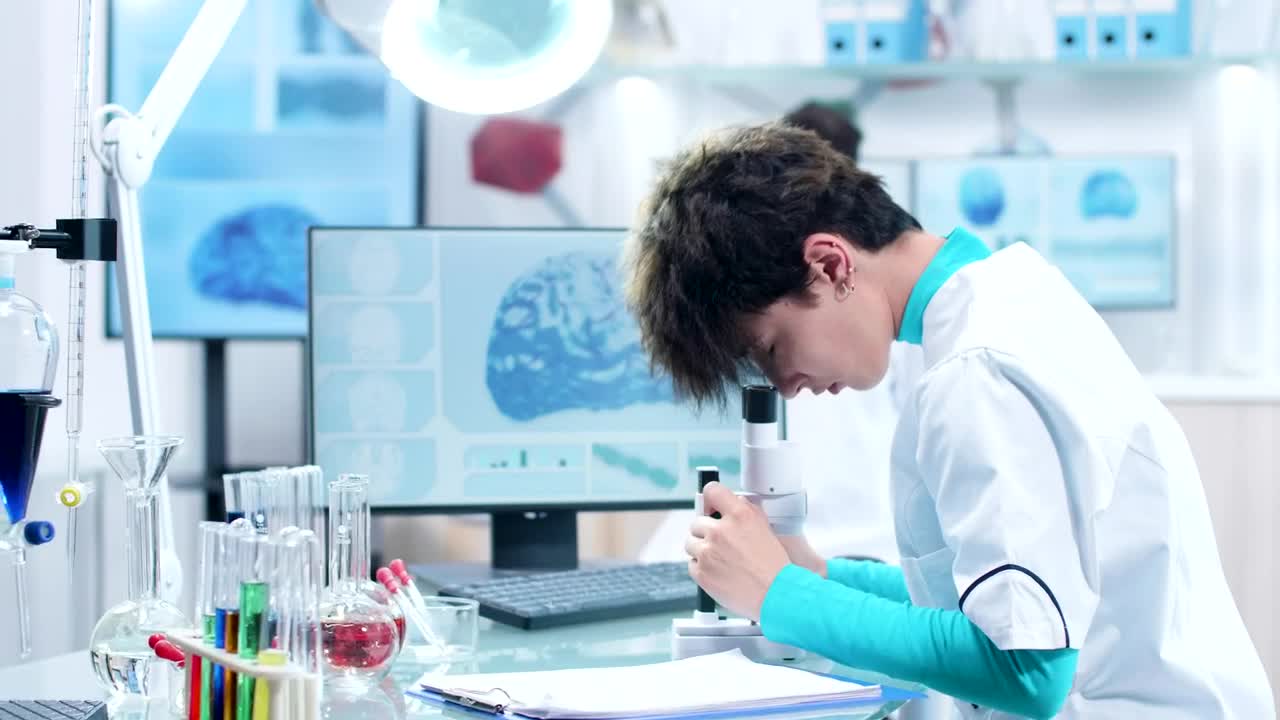 Stock Footage Young Researcher Typing Notes Live Wallpaper Free