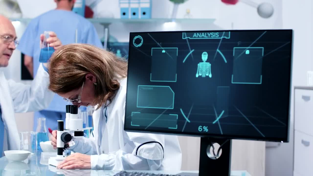 Stock Footage Woman Looking Through A Microscope Live Wallpaper Free
