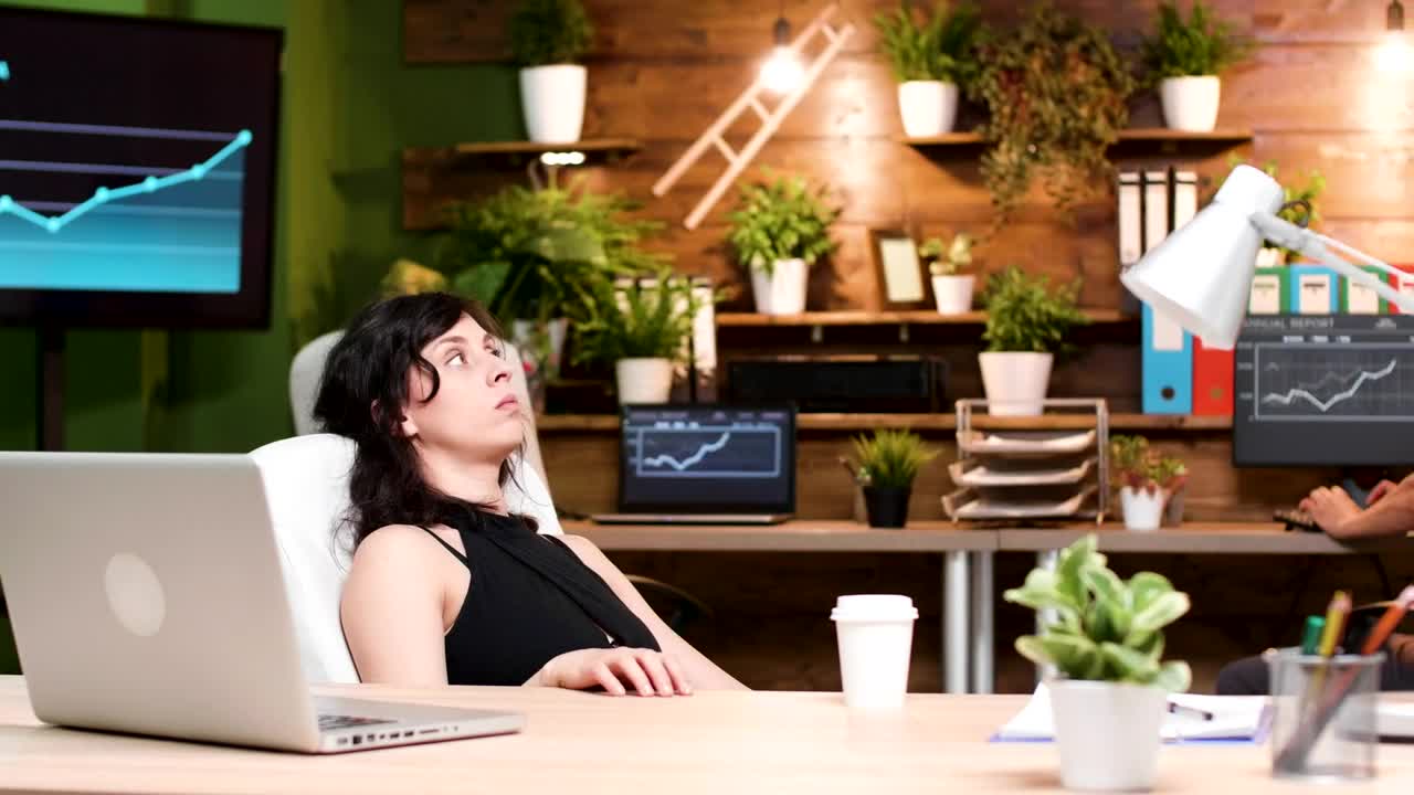 Stock Footage Young Woman Thinking At Her Desk Live Wallpaper Free