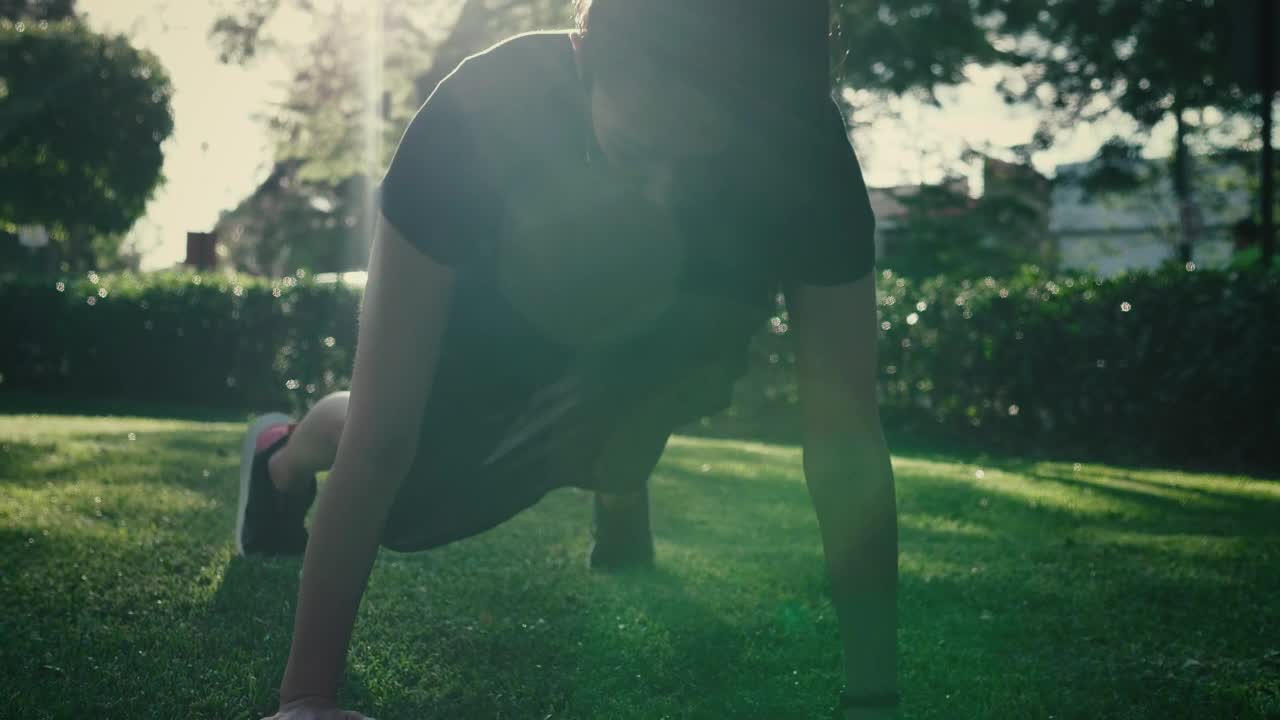 Stock Footage Young Woman Doing Push Ups On The Grass In A Park Live Wallpaper Free