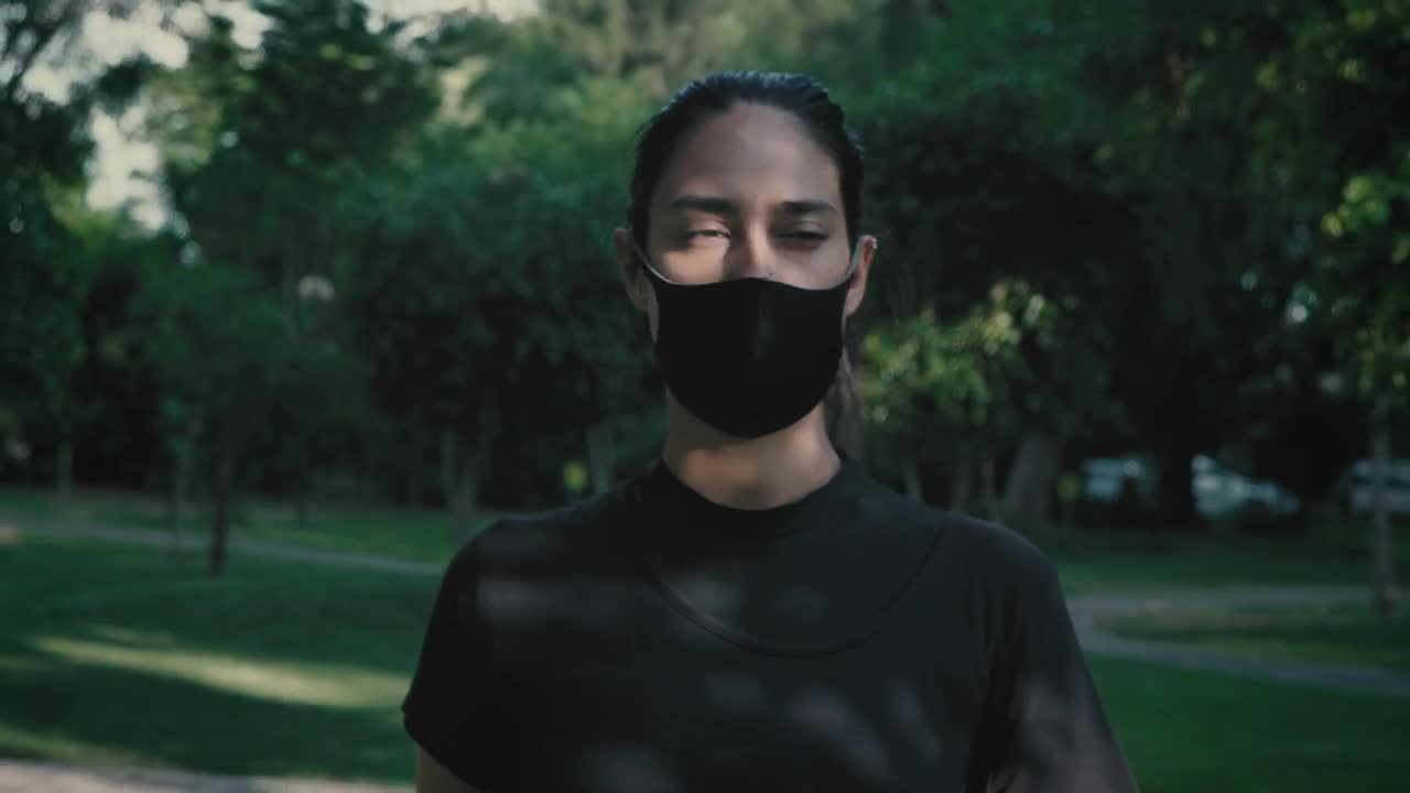 Stock Footage Woman Walking With Mask On Outdoors Live Wallpaper Free