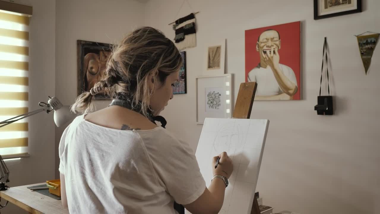 Stock Footage Woman Drawing Baselines On A White Canvas Live Wallpaper Free