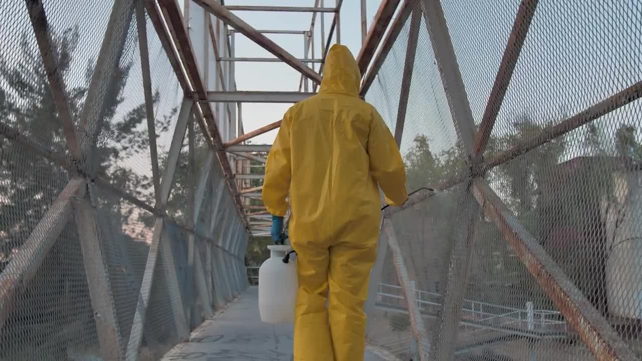 Stock Footage Workers Disinfecting A Bridge Live Wallpaper Free