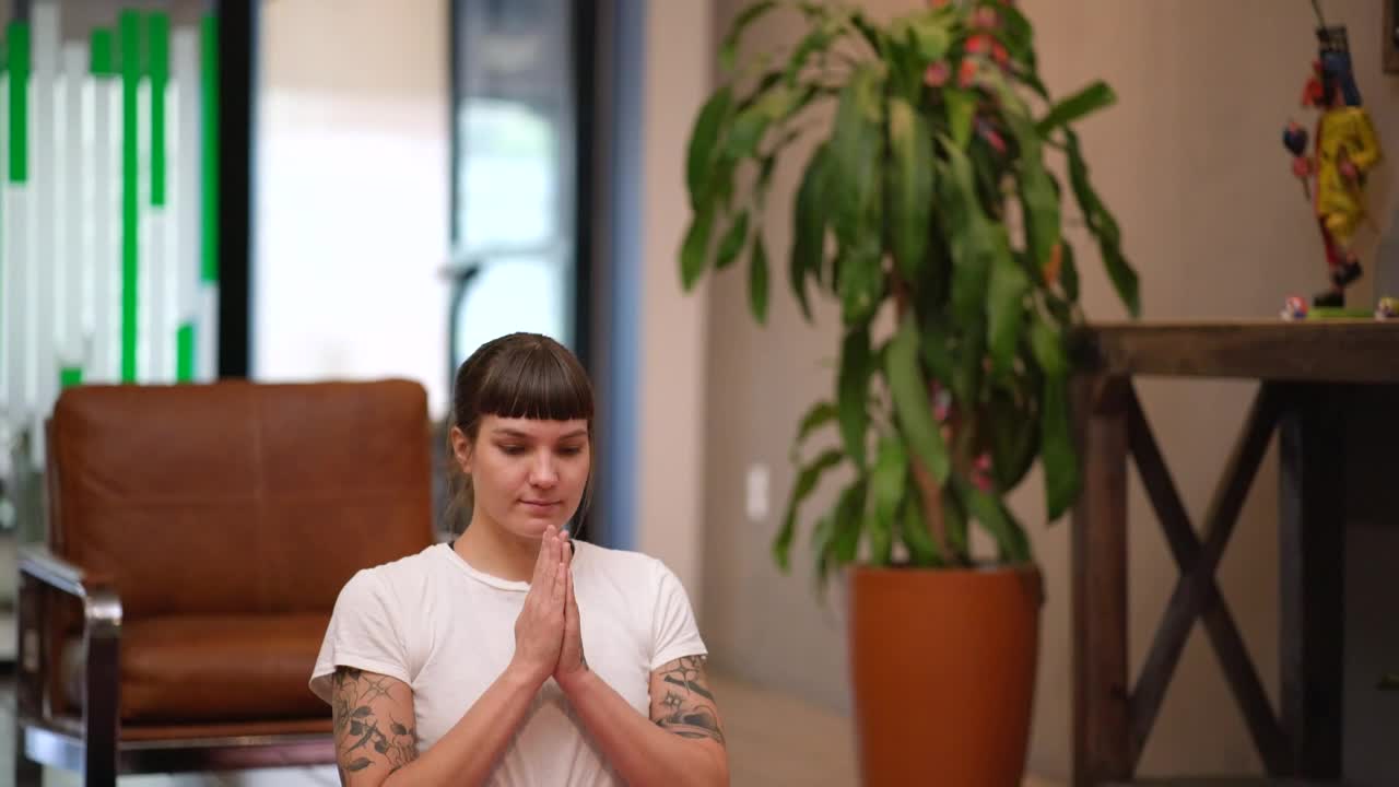 Stock Footage Young Woman Practicing Yoga On Her Living Room Floor Live Wallpaper Free