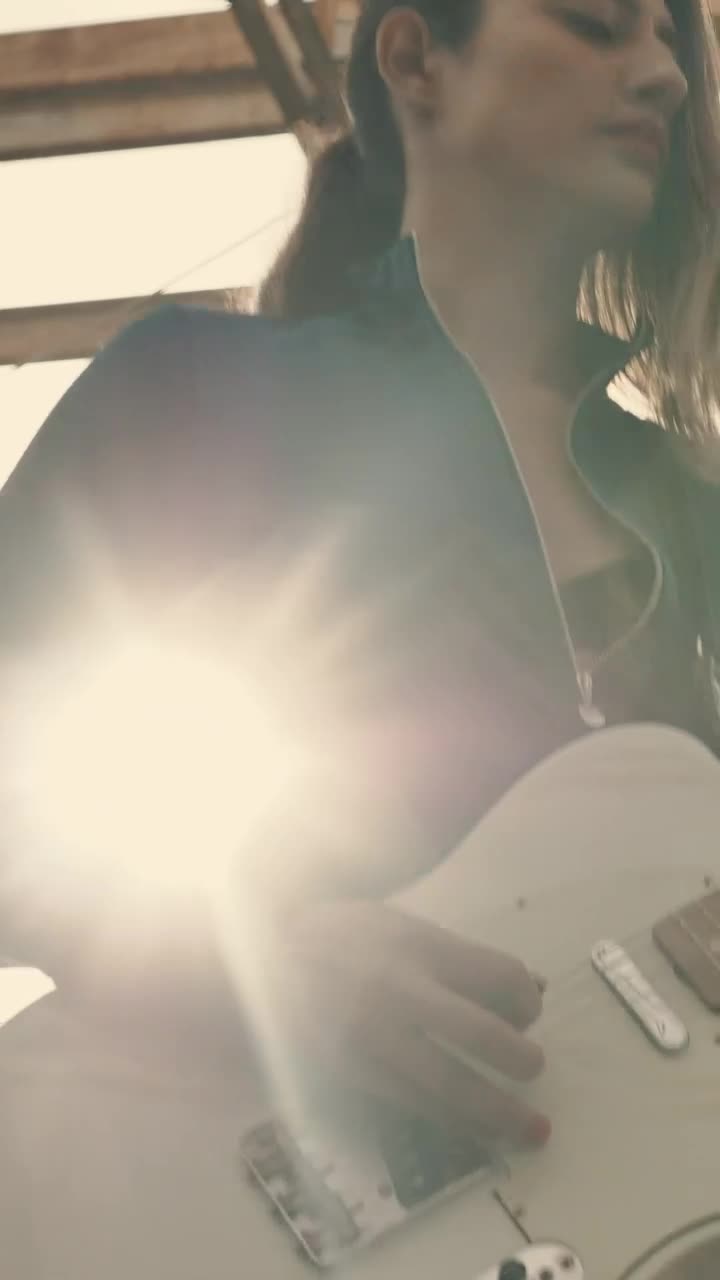 Stock Footage Young Woman Playing A White Electric Guitar Live Wallpaper Free