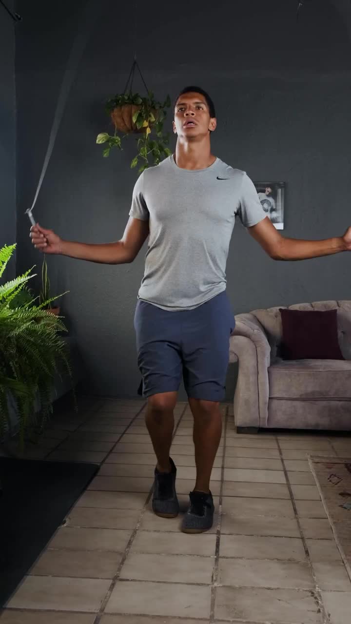 Stock Footage Young Sportsman Jumping Rope At Home Live Wallpaper Free