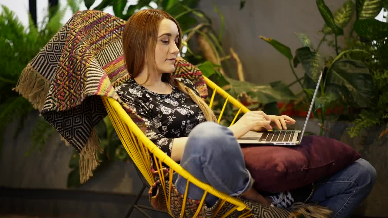 Stock Footage Woman In A Garden Working On A Computer Live Wallpaper Free