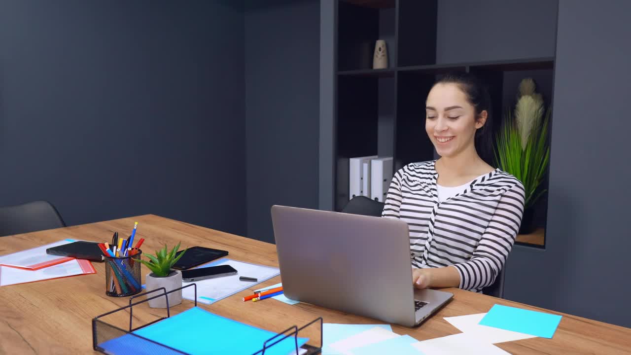 Stock Footage Young Female Employee Having A Video Call With A Client Live Wallpaper Free