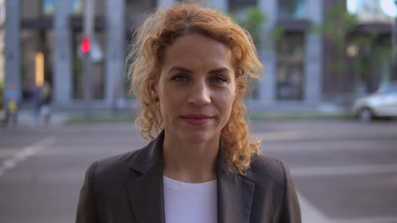 Stock Footage Woman On The Street Watching Head On In The Foreground Live Wallpaper Free