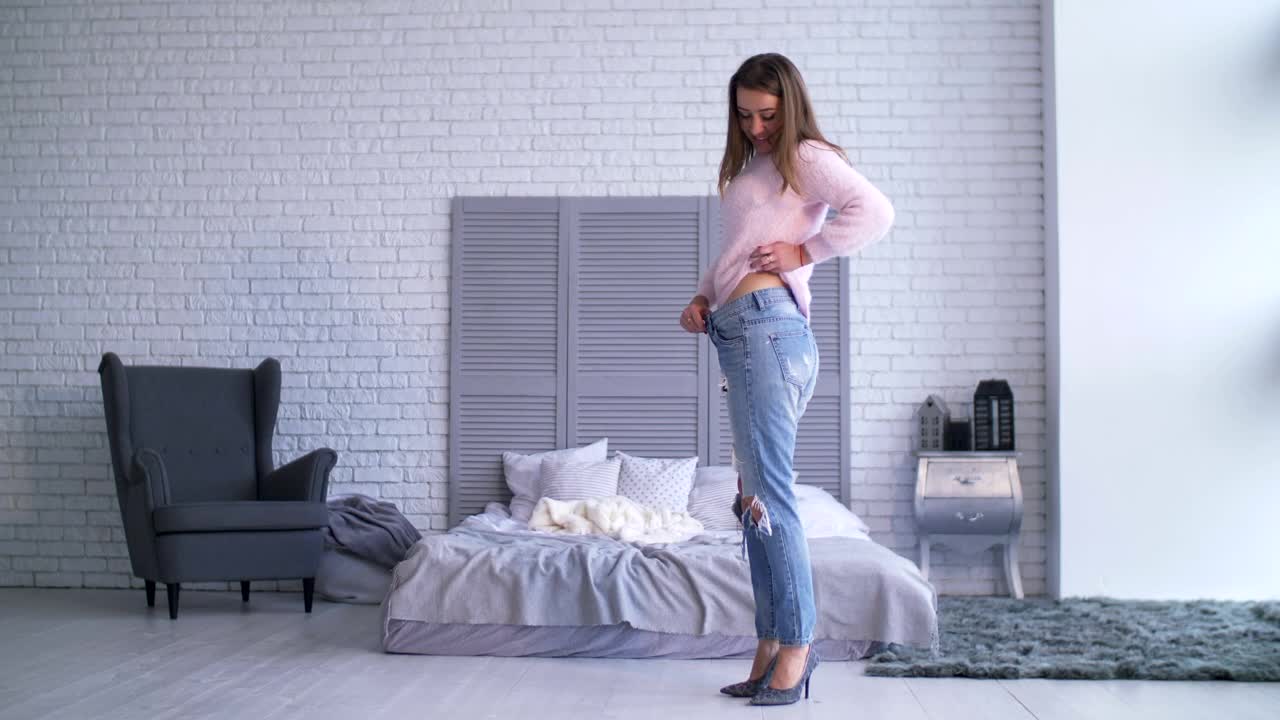 Stock Footage Woman Is Happy With Her Weight Live Wallpaper Free