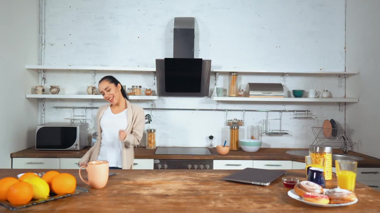 Stock Footage Young Woman Dancing Happily In The Kitchen Live Wallpaper Free