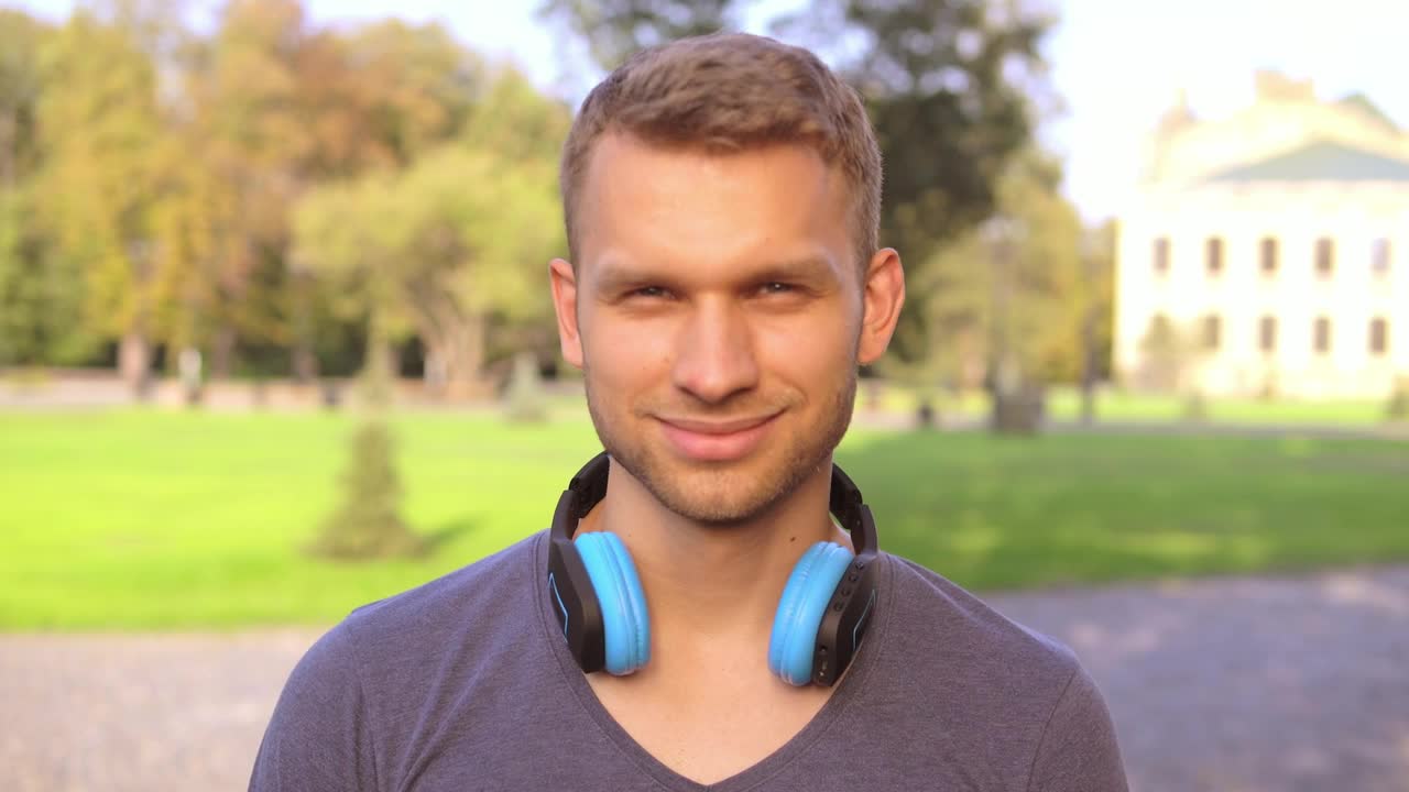 Stock Footage Young Man In A Garden Smiles From The Front Live Wallpaper Free