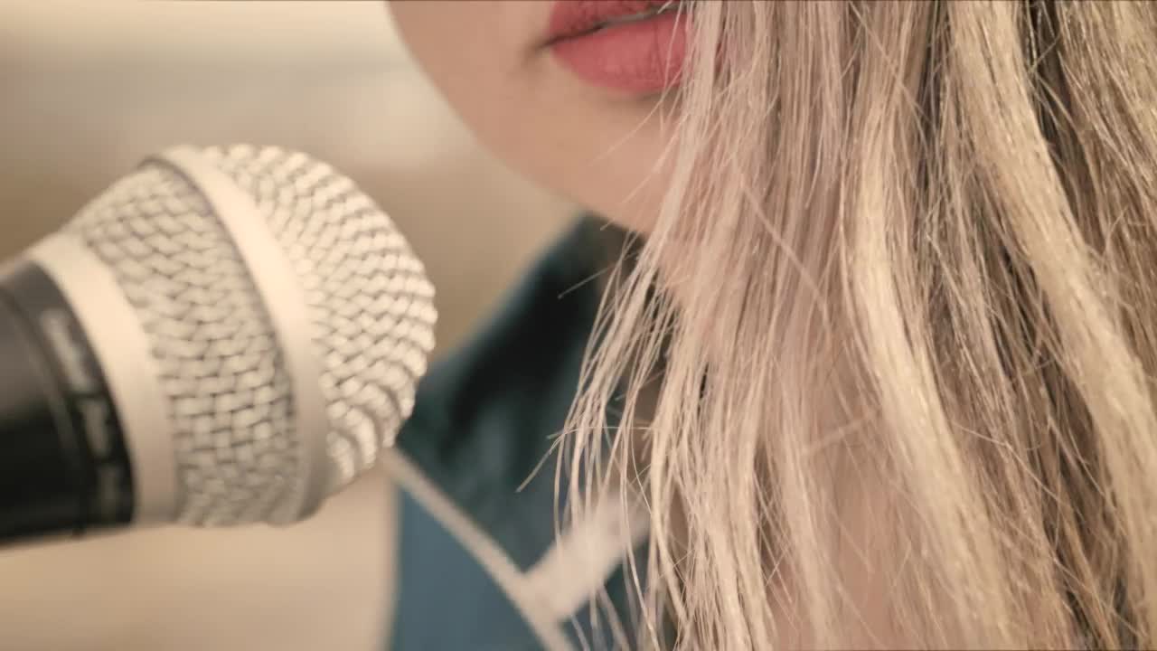 Stock Footage Woman Singing Into A Microphone Closeup Live Wallpaper Free