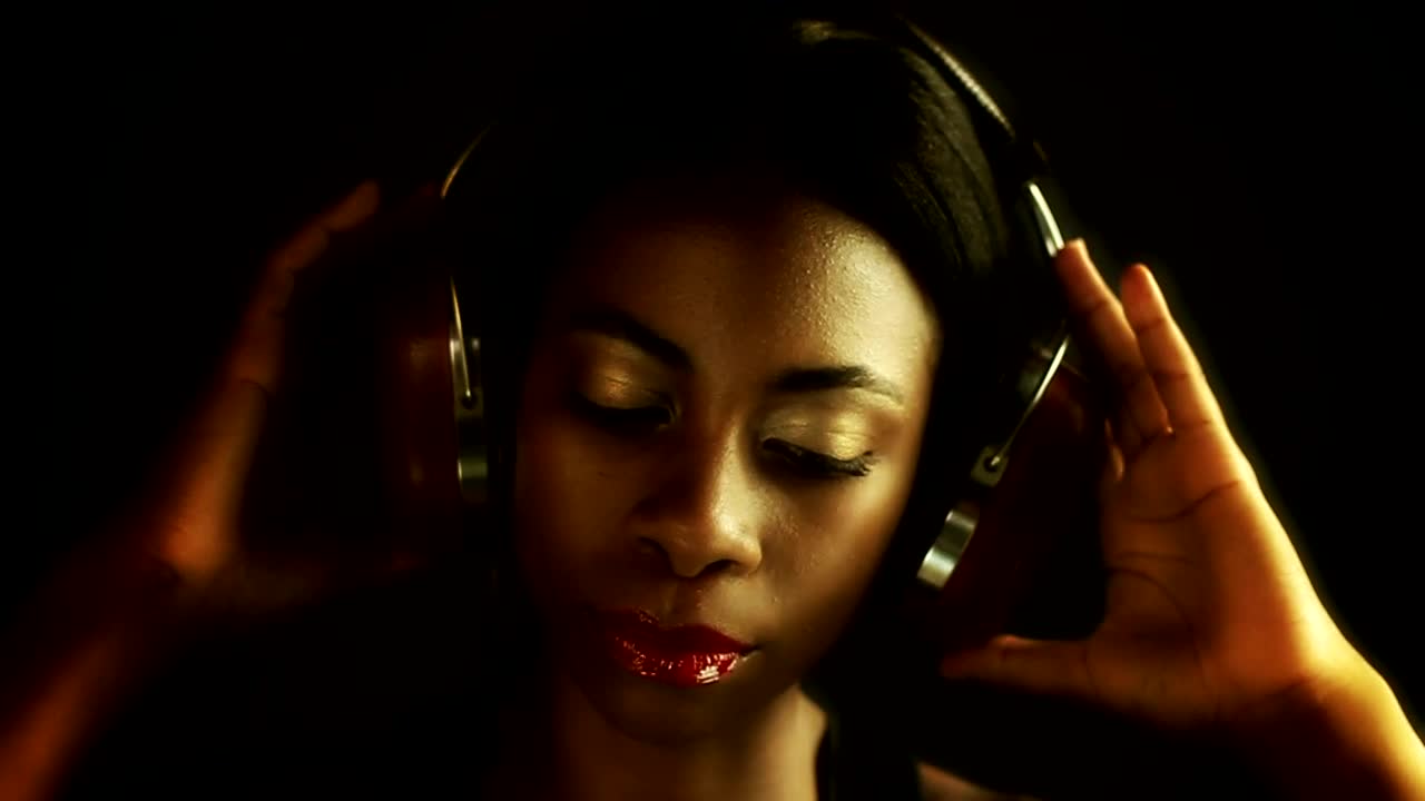Stock Footage Woman Listening To Music In A Dark Room Live Wallpaper Free