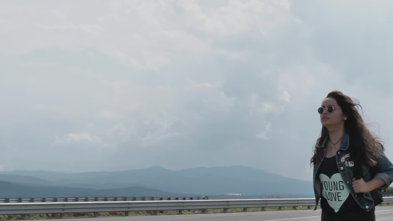 Stock Footage Young Woman Asking For A Ride By The Road Live Wallpaper Free