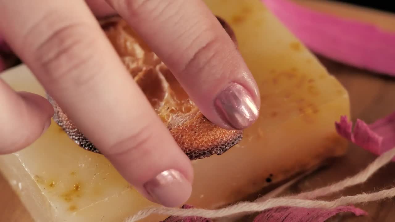 Stock Footage Womans Hands Decorating A Handmade Soap Live Wallpaper Free