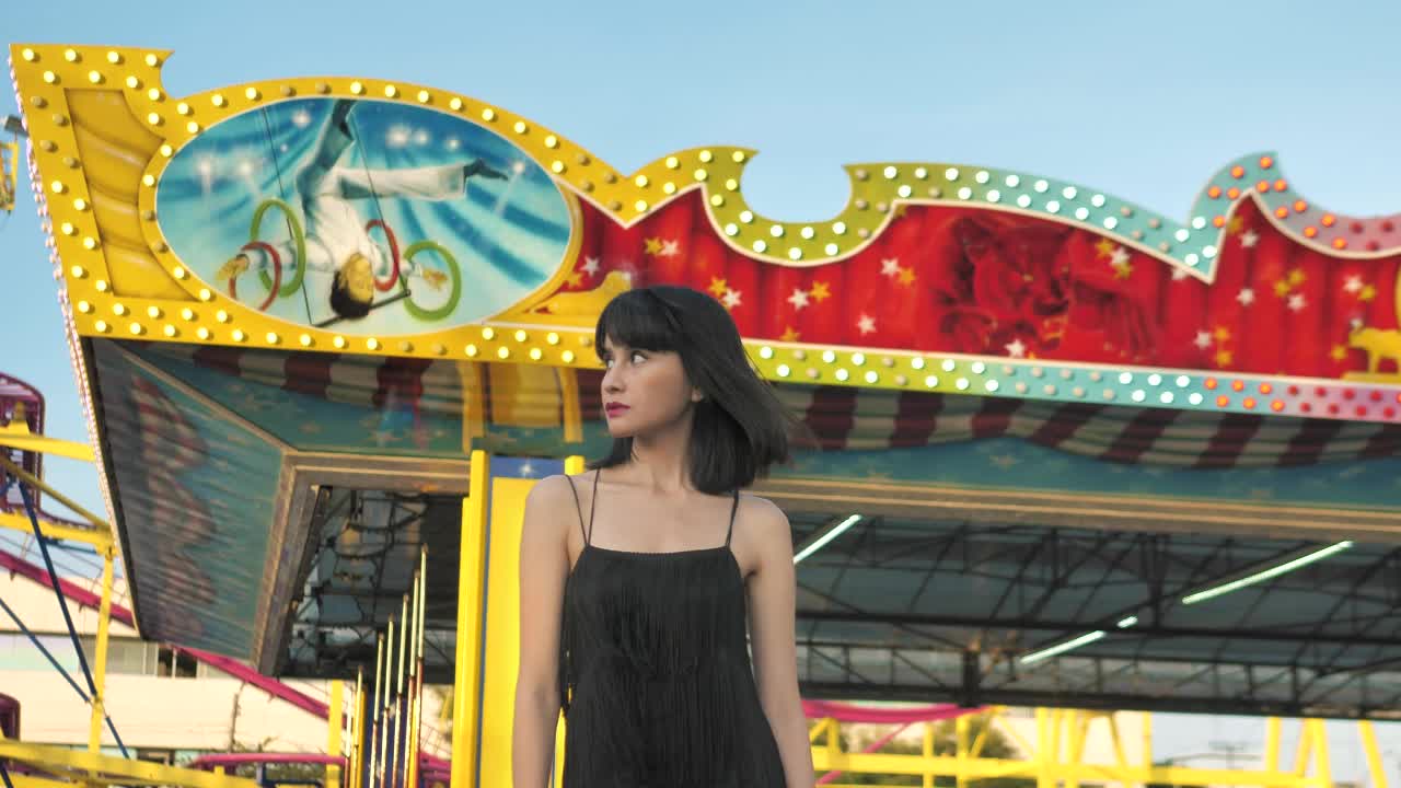 Stock Footage Young Woman In Amusement Park Live Wallpaper Free