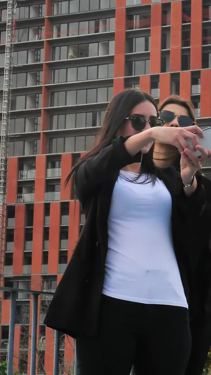 Stock Footage Women Taking Photos On A Balcony Live Wallpaper Free