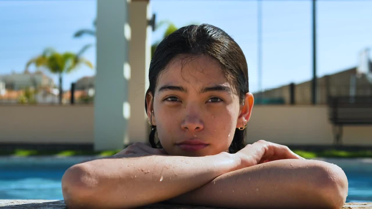 Stock Footage Woman Lounging On The Edge Of The Pool Live Wallpaper Free