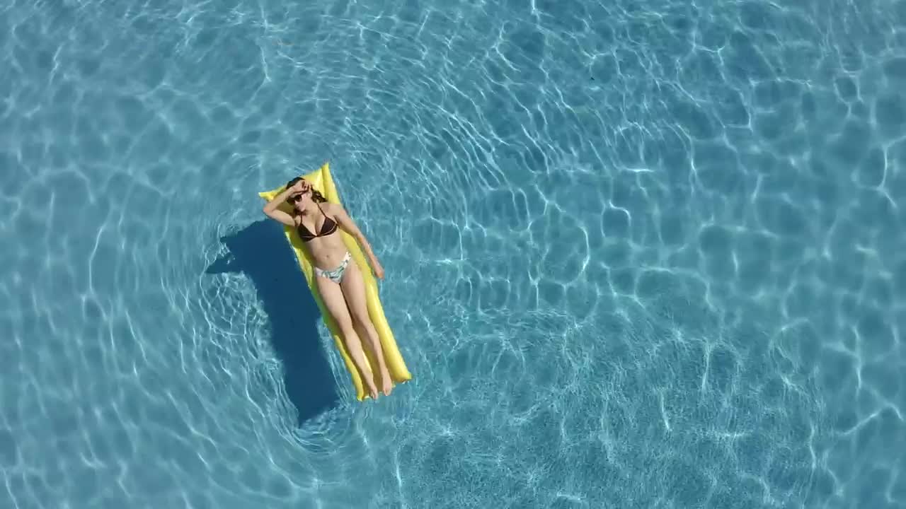 Stock Footage Woman Enjoying Summer Sun At A Pool Live Wallpaper Free