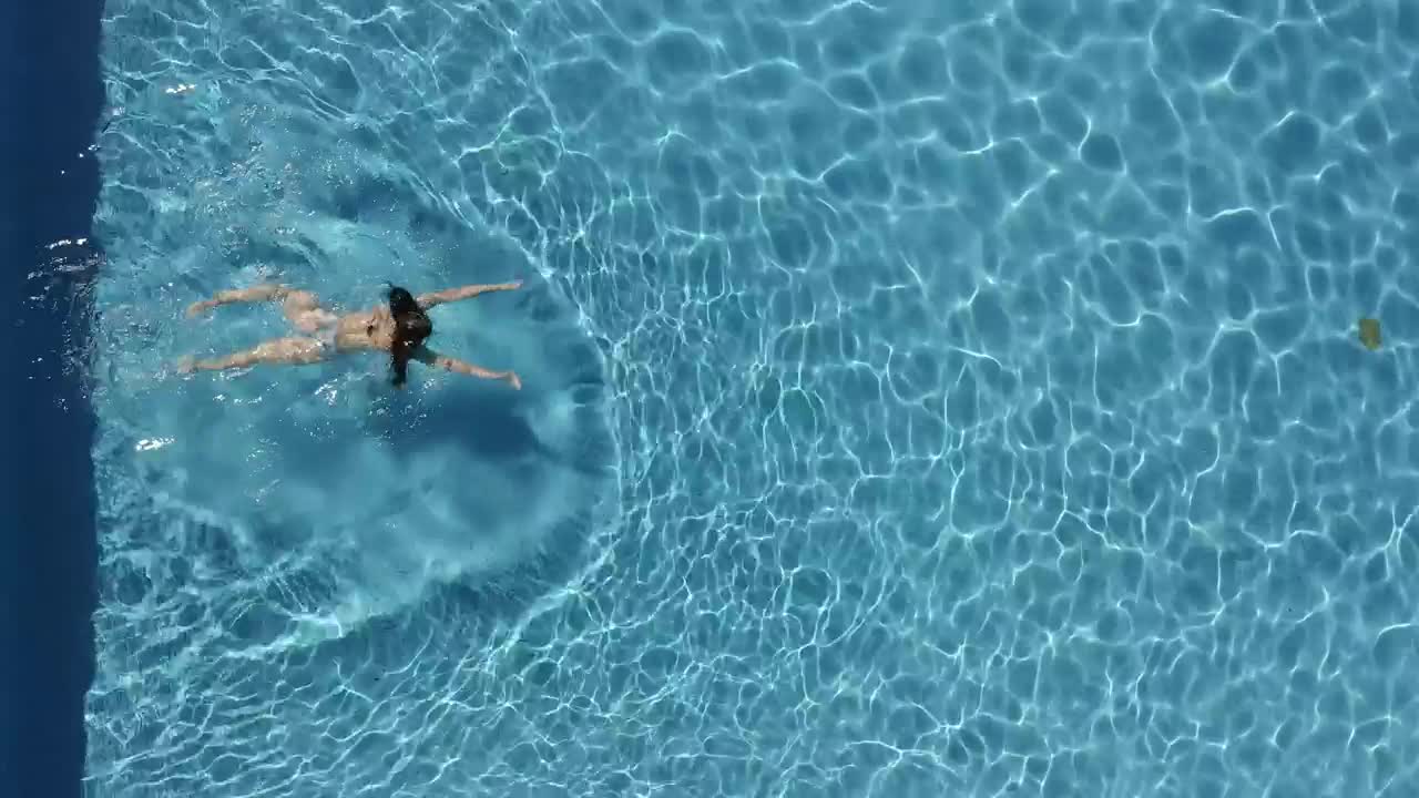 Stock Footage Woman In Bikini Swimming Live Wallpaper Free
