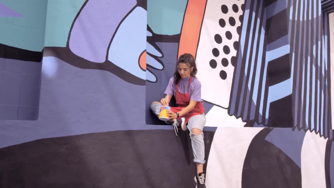 Stock Footage Woman Painting A Mural Live Wallpaper Free