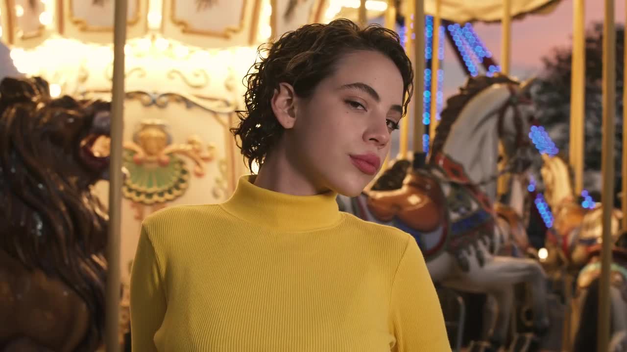 Stock Footage Woman Standing In Front Of Carrousel Live Wallpaper Free