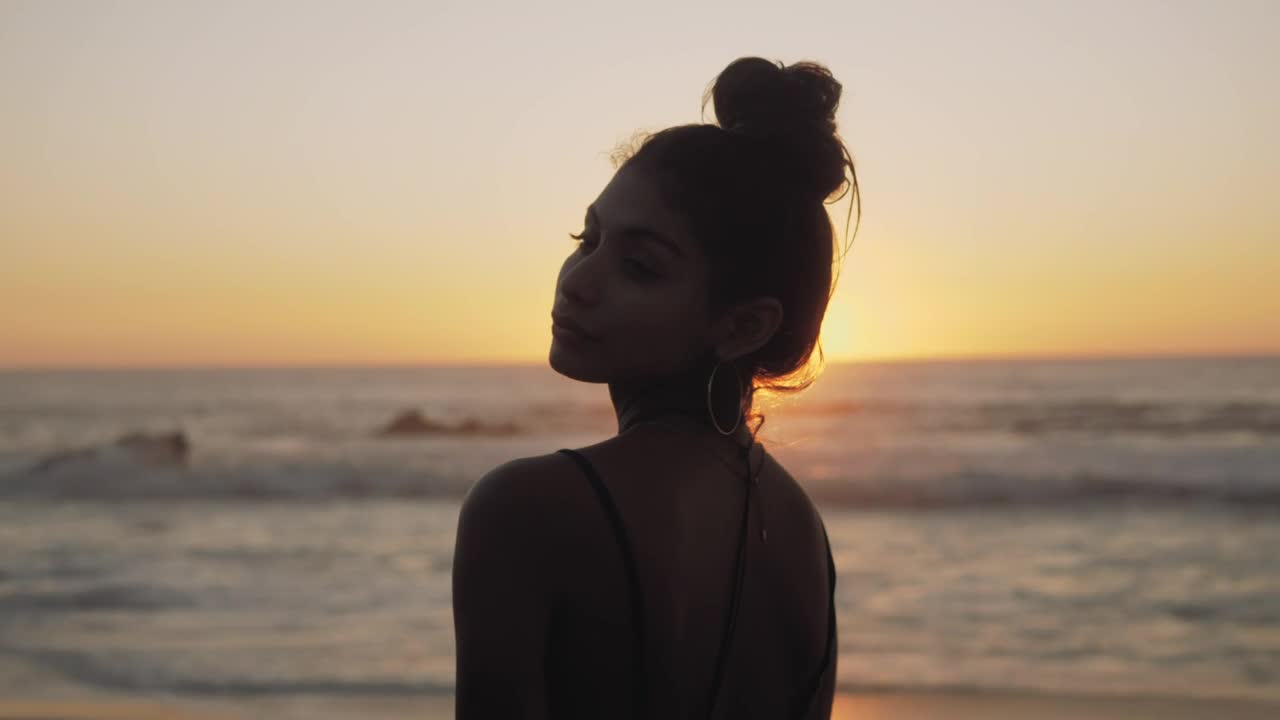 Stock Footage Woman Lets Down Hair At The Beach Live Wallpaper Free