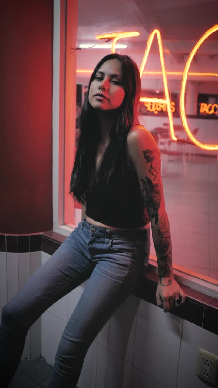 Stock Footage Woman With Tattoos In A Shop Window Live Wallpaper Free