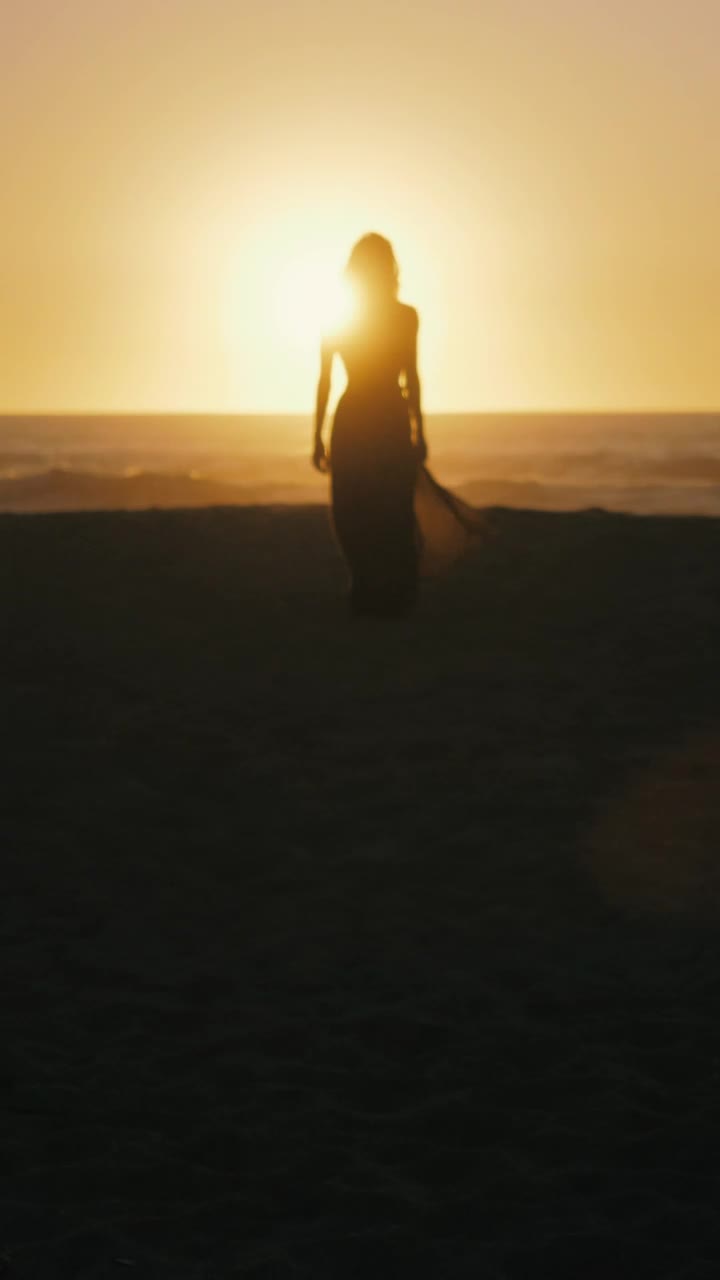 Stock Footage Womans Silhouette Walking On The Beach At Sunset Live Wallpaper Free