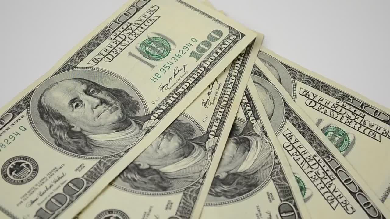 Stock Video 100 dollar bills spinnin PC Live Wallpaper