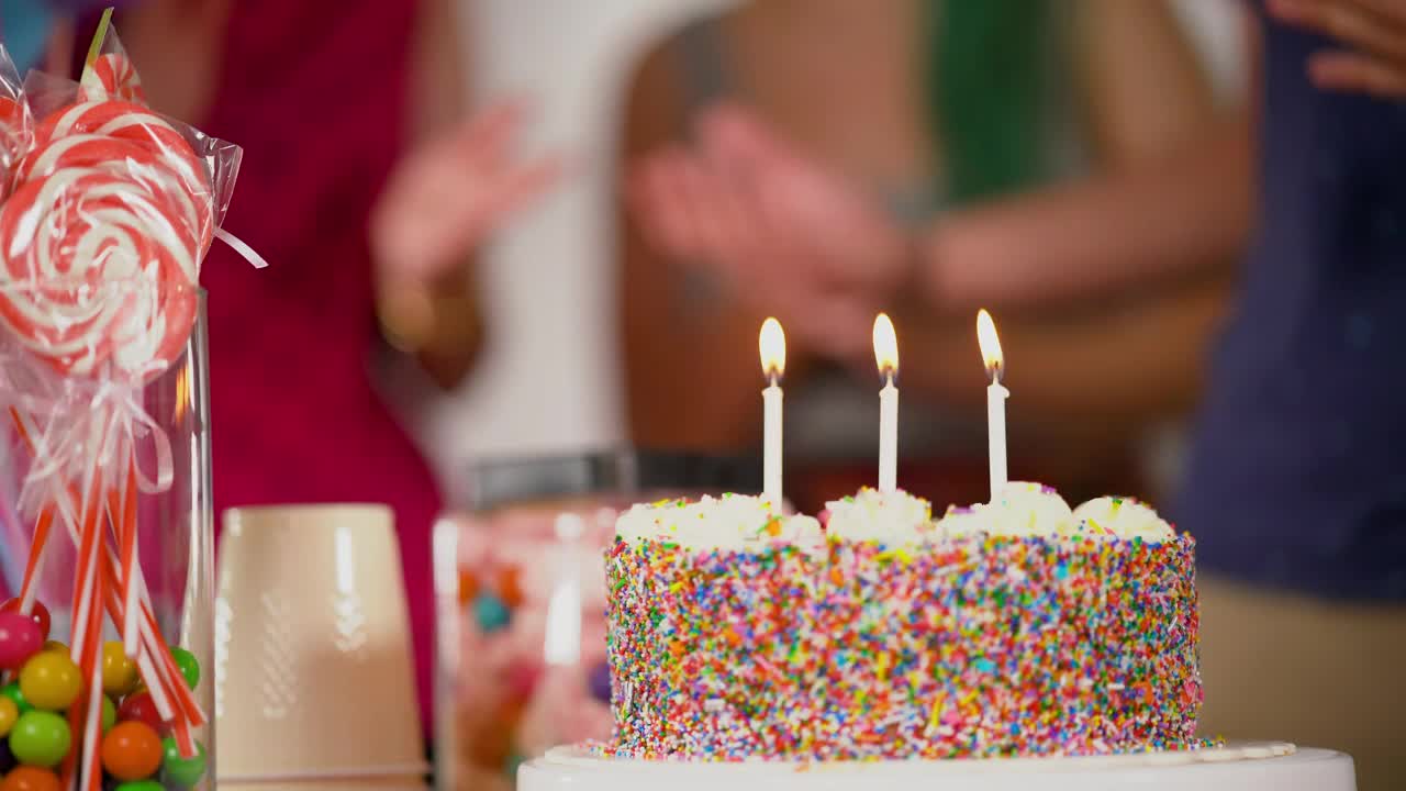 Stock Video A Birthday Man Blows Out The Candles On His Cake Live Wallpaper for PC