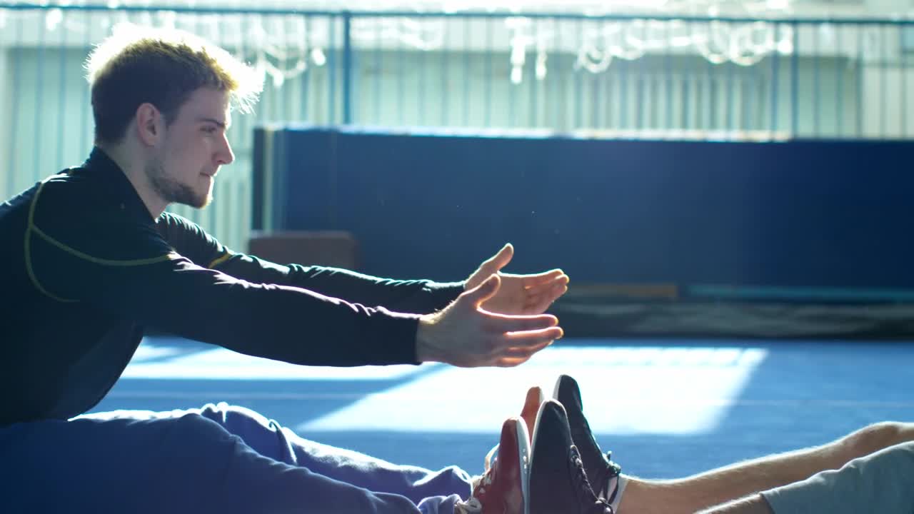 Stock Video A Couple Of Athletes Stretching Each Other Live Wallpaper for PC