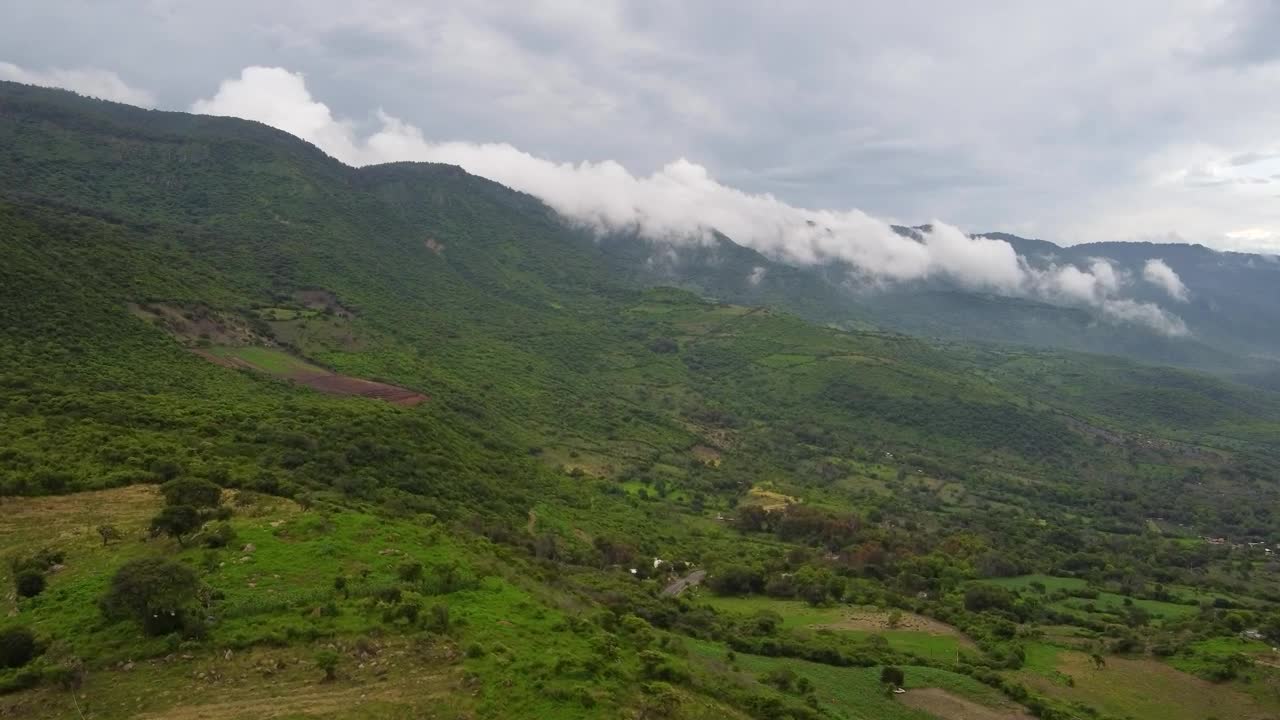 Stock Video Aerial Panorama Over A Mountainous Relief Full Of Vegetation Live Wallpaper for PC
