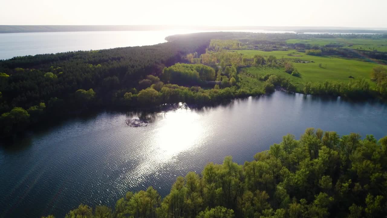 Stock Video Aerial Shot Of A River Crossing The Field In Spring Live Wallpaper for PC