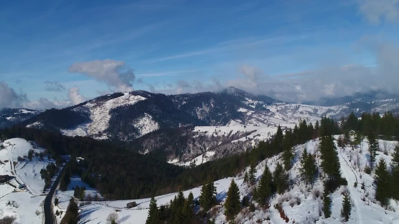 Stock Video Aerial Shot Of A Winter Landscape On A Sunny Day Live Wallpaper for PC