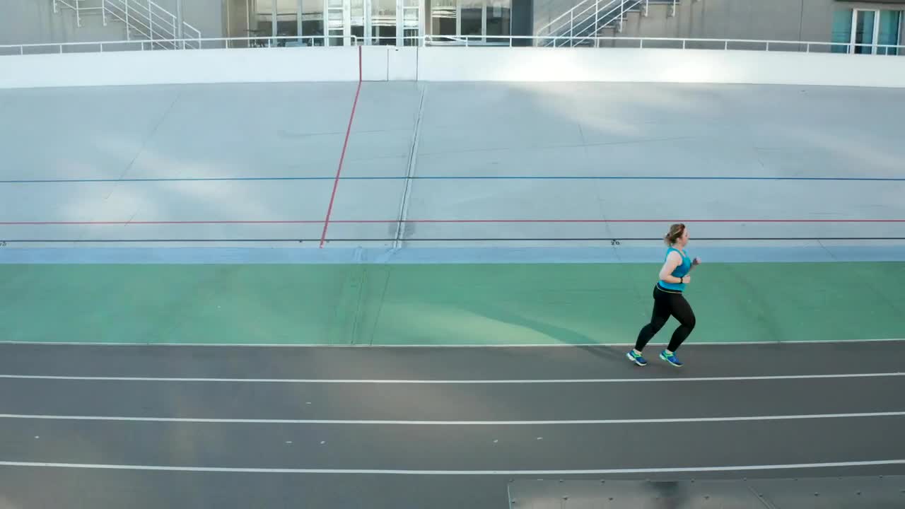 Stock Video Aerial Shot Of A Woman Running Live Wallpaper for PC