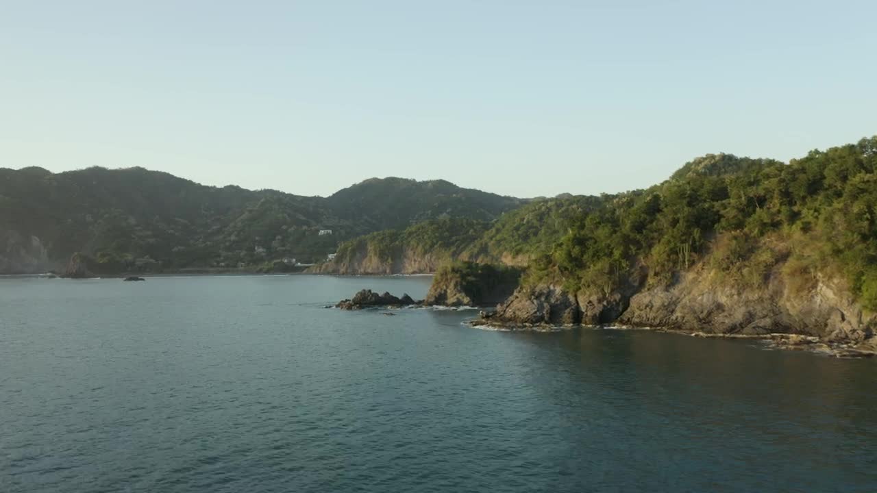 Stock Video Aerial Tour Around A Coastline On A Sunny Day Live Wallpaper for PC
