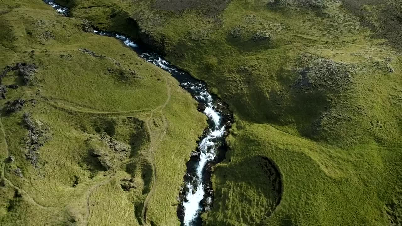 Stock Video Aerial View Of A River And A Waterfall On A Live Wallpaper for PC