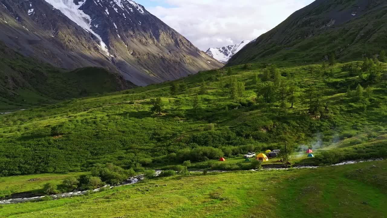 Stock Video Aerial View Of Campsite On Creek In Mountain Valley Live Wallpaper for PC