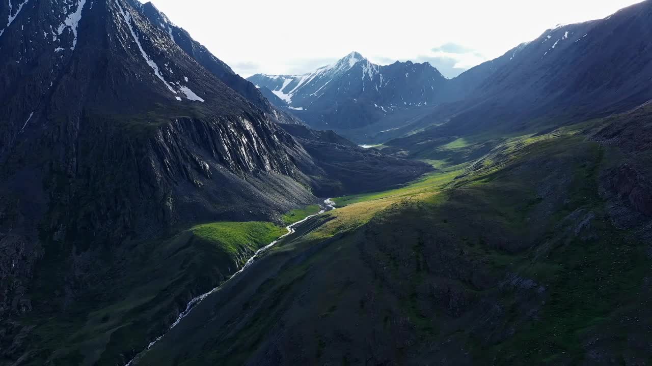 Stock Video Aerial View Of River Through Mountain Pass Live Wallpaper for PC