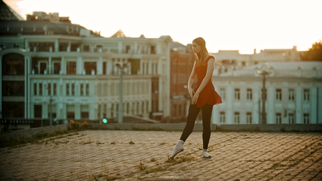 Stock Video Ballet Dancer Dancing On The Roof Of A Building In Live Wallpaper For PC