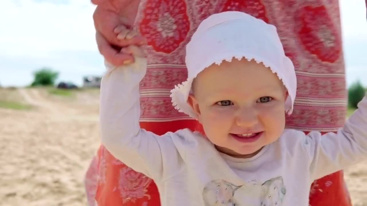 Stock Video Baby Walking With Help From Their Mother Live Wallpaper For PC