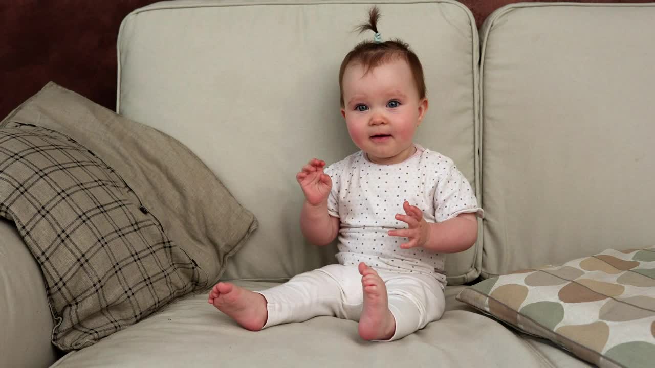 Stock Video Baby Smiling On The Sofa Live Wallpaper For PC