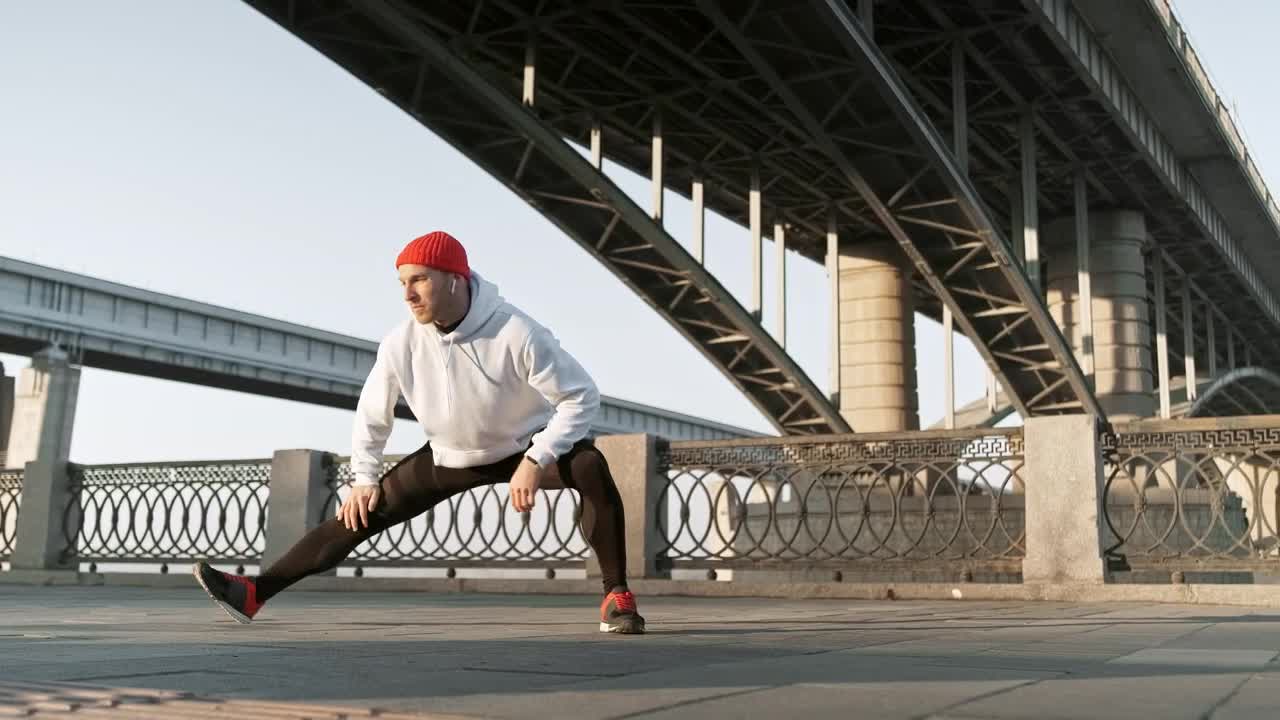 Stock Video Athlete Stretching His Legs In The Street Live Wallpaper For PC