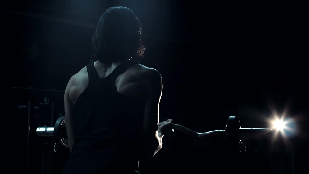 Stock Video Athlete Lifting The Barbell In A Dark Room Live Wallpaper For PC
