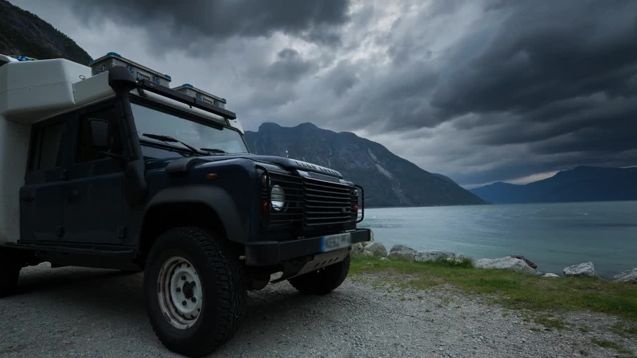 Stock Video An Off Road Camper Van By The Lake Live Wallpaper For PC